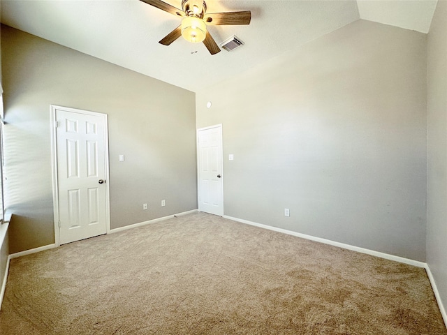 empty room featuring baseboards, visible vents, ceiling fan, and carpet flooring