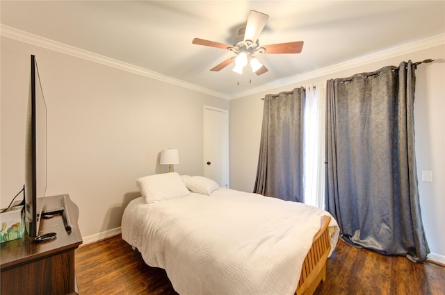bedroom with wood finished floors, ceiling fan, baseboards, and ornamental molding