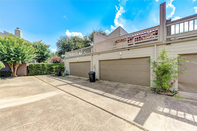 exterior space with concrete driveway