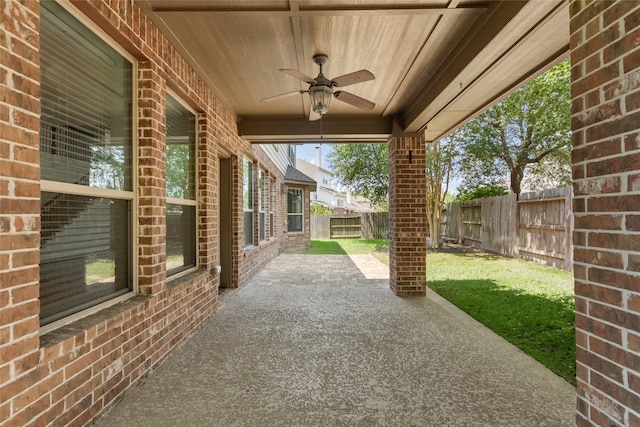 view of patio featuring a fenced backyard and ceiling fan