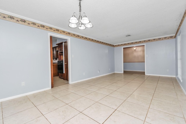 800 Fairway Dr, Richmond, TX 77469 - spare room featuring baseboards, an inviting chandelier, ornamental molding, a textured ceiling, and light tile patterned flooring
