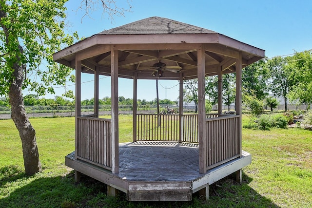 exterior space featuring a gazebo and a lawn