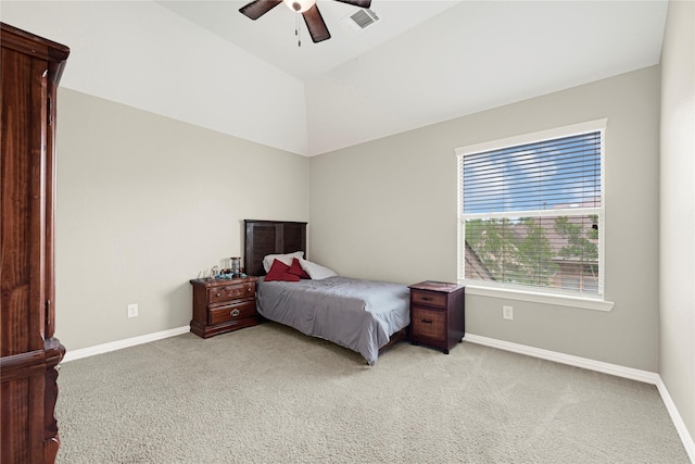 bedroom with baseboards, visible vents, a ceiling fan, and light carpet