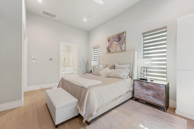 513 Pineal Dr, Montgomery, TX 77316 - bedroom featuring light wood-style flooring, baseboards, recessed lighting, and ensuite bathroom