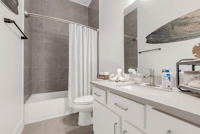 full bath with shower / bath combo with shower curtain, tile patterned flooring, vanity, and toilet