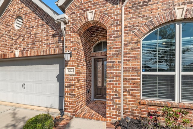 19122 Panther Cave Ct, Cypress, TX 77433 - property entrance featuring a garage and brick siding