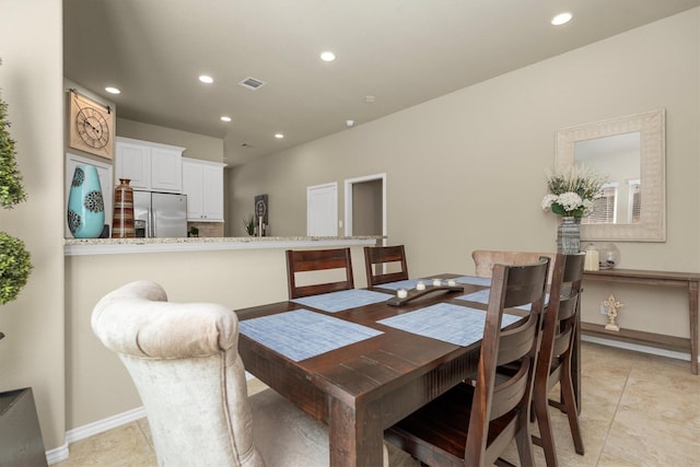 19122 Panther Cave Ct, Cypress, TX 77433 - dining room with light tile patterned floors, visible vents, and recessed lighting