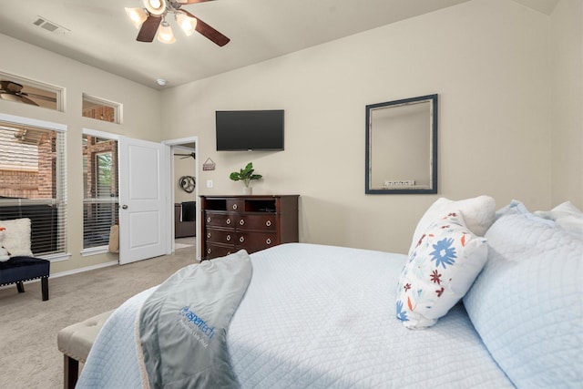19122 Panther Cave Ct, Cypress, TX 77433 - carpeted bedroom featuring lofted ceiling, a ceiling fan, and visible vents