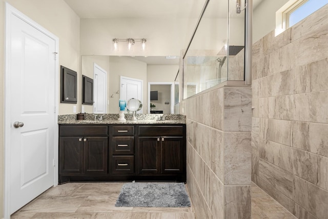19122 Panther Cave Ct, Cypress, TX 77433 - bathroom featuring a sink, walk in shower, and double vanity