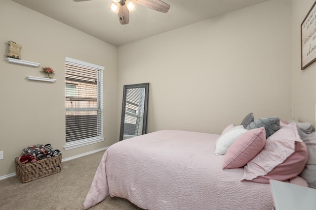 19122 Panther Cave Ct, Cypress, TX 77433 - bedroom with baseboards, a ceiling fan, and carpet