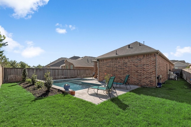 19122 Panther Cave Ct, Cypress, TX 77433 - view of swimming pool with a patio, a fenced backyard, and a lawn