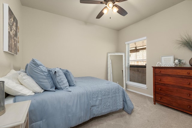 19122 Panther Cave Ct, Cypress, TX 77433 - bedroom featuring ceiling fan, light carpet, and baseboards