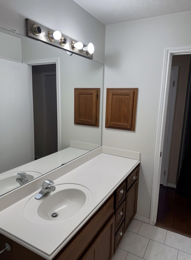 8622 Sparkling Springs Dr, Houston, TX 77095 - bathroom featuring tile patterned floors and vanity