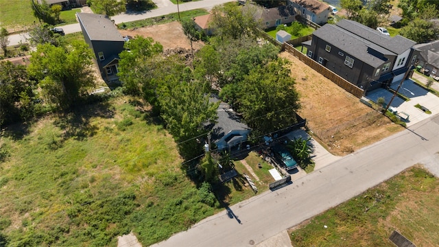 birds eye view of property with a residential view