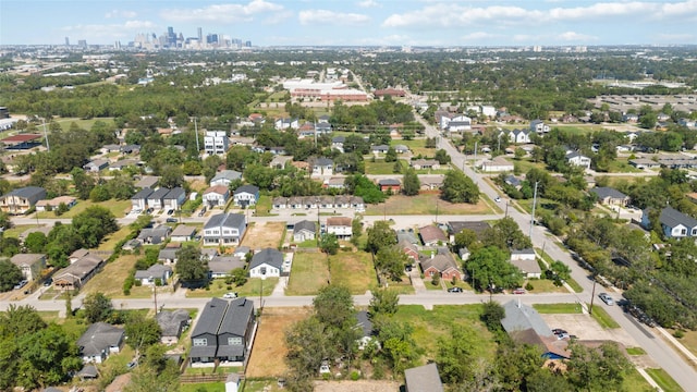 drone / aerial view featuring a view of city and a residential view