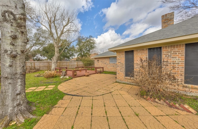 view of patio / terrace with fence