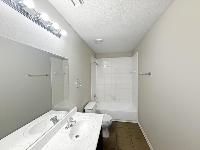 12223 Forstall Dr, Houston, TX 77014 - full bath with tile patterned flooring, visible vents, toilet,  shower combination, and a textured ceiling