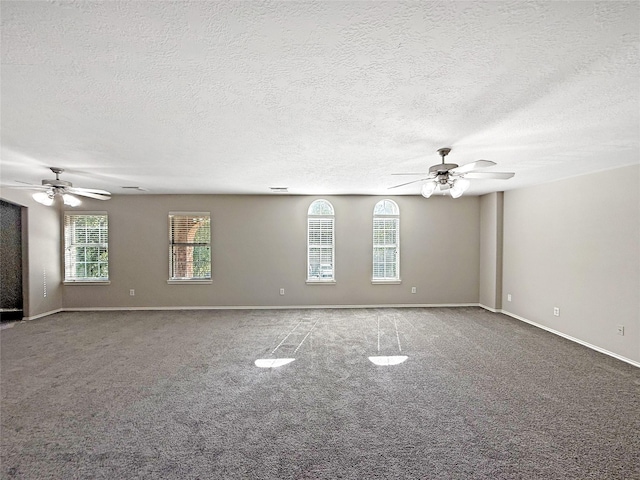 12223 Forstall Dr, Houston, TX 77014 - carpeted spare room featuring baseboards, a textured ceiling, and ceiling fan
