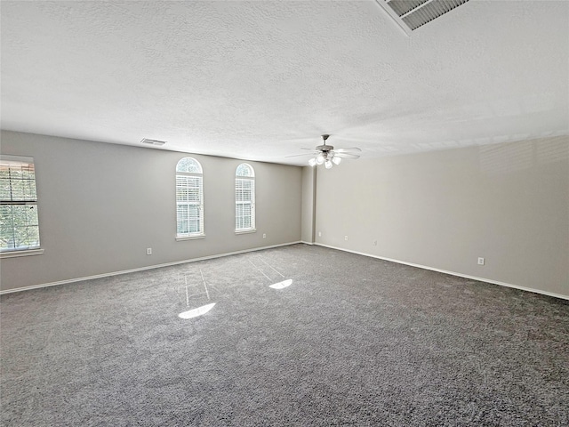 12223 Forstall Dr, Houston, TX 77014 - unfurnished room featuring plenty of natural light, visible vents, a ceiling fan, and carpet flooring