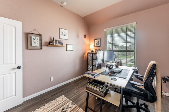 office space with baseboards and wood finished floors