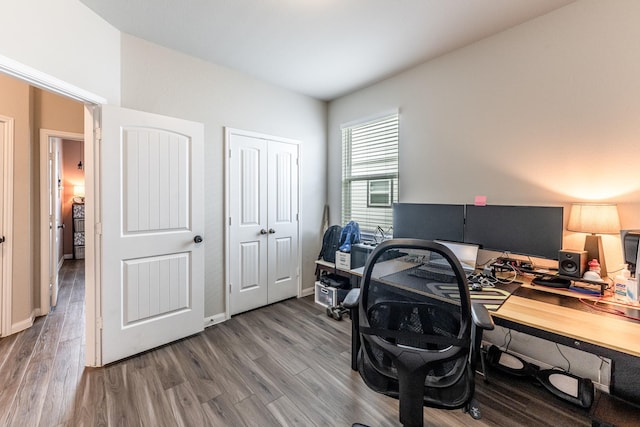 office area featuring wood finished floors and baseboards