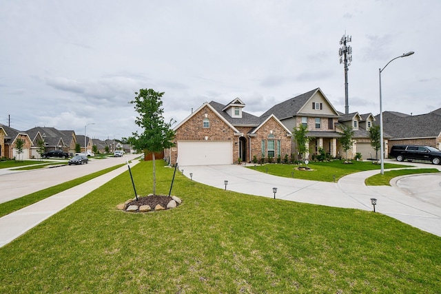 view of front facade featuring a front lawn, driveway, an attached garage, brick siding, and a residential view