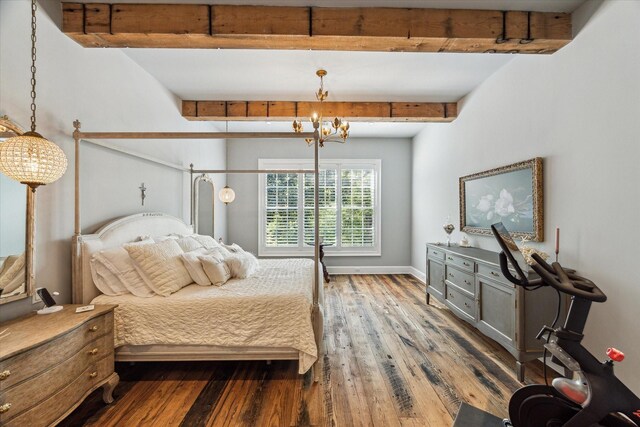bedroom featuring beam ceiling, a chandelier, wood finished floors, and baseboards