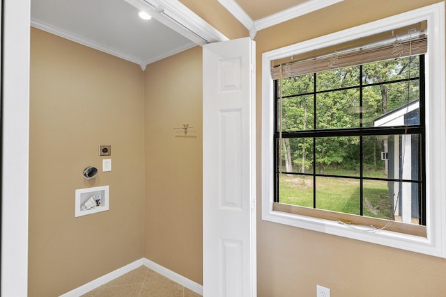washroom featuring laundry area, light tile patterned floors, hookup for an electric dryer, crown molding, and baseboards