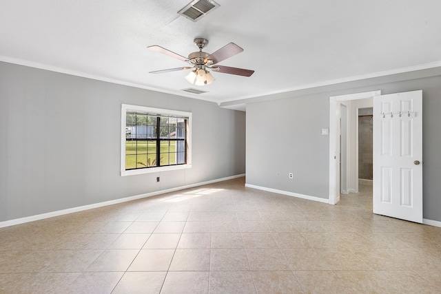 unfurnished room featuring visible vents, crown molding, ceiling fan, and light tile patterned floors