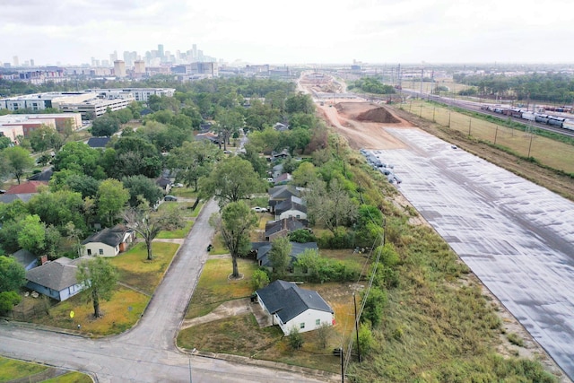 birds eye view of property with a view of city