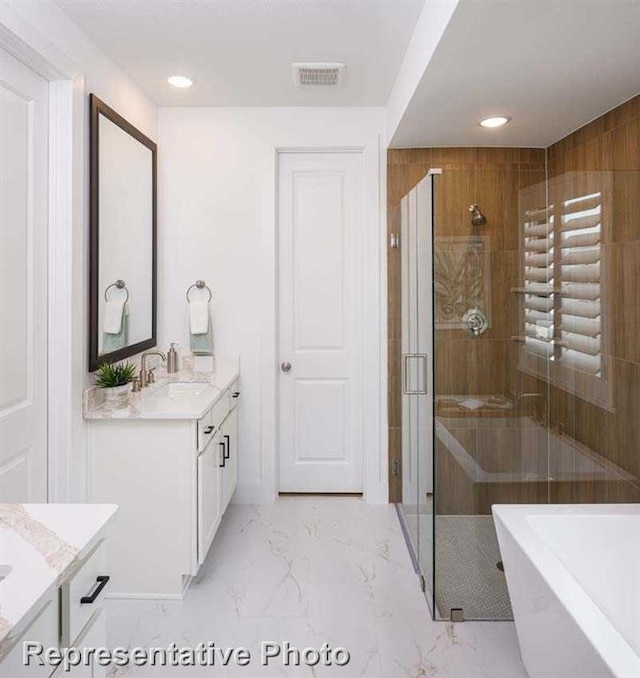 full bath featuring a shower stall, visible vents, marble finish floor, and vanity