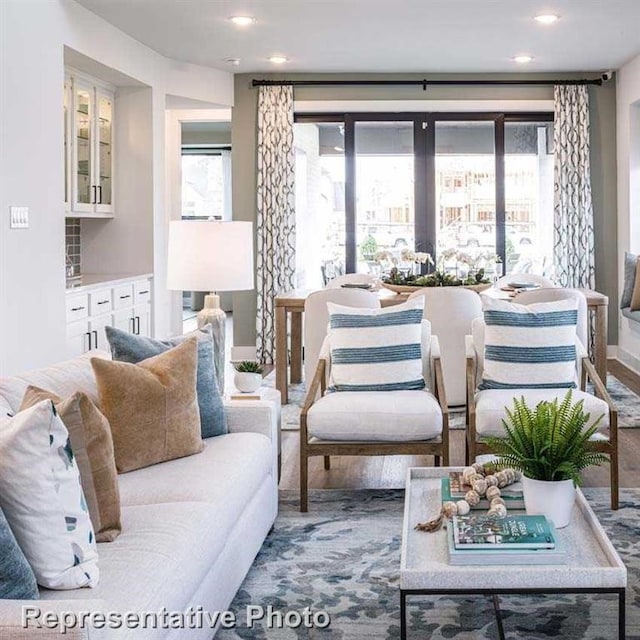 living area featuring recessed lighting and plenty of natural light