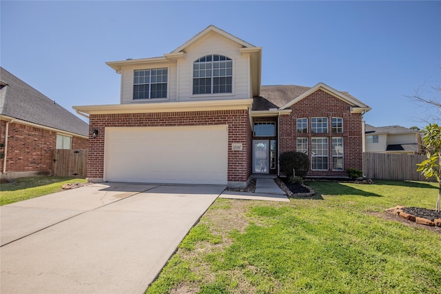 traditional home with brick siding, concrete driveway, a front lawn, and fence