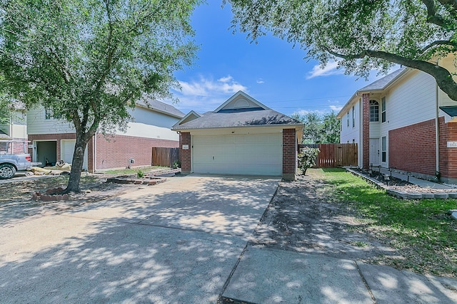 6626 Rusty Ridge Ln, Katy, TX 77449 - ranch-style home with brick siding, fence, driveway, and a garage