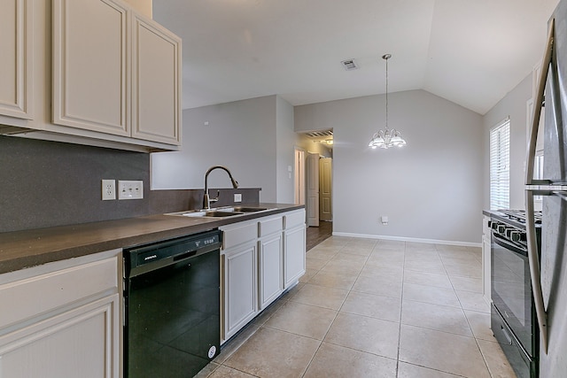 6626 Rusty Ridge Ln, Katy, TX 77449 - kitchen featuring dark countertops, a sink, black appliances, lofted ceiling, and visible vents