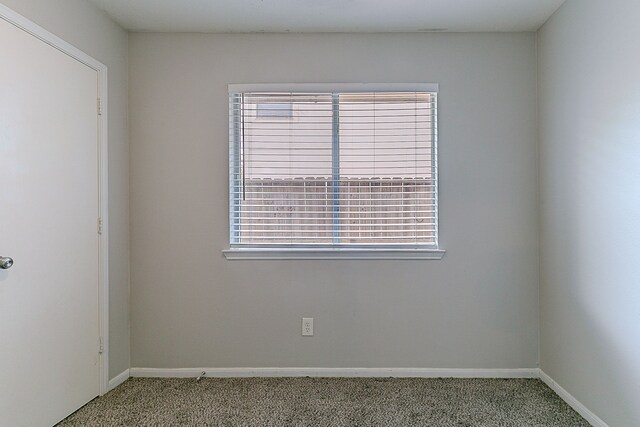 6626 Rusty Ridge Ln, Katy, TX 77449 - unfurnished room with baseboards and carpet floors