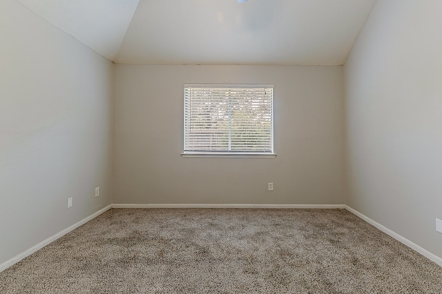 6626 Rusty Ridge Ln, Katy, TX 77449 - carpeted spare room featuring vaulted ceiling and baseboards