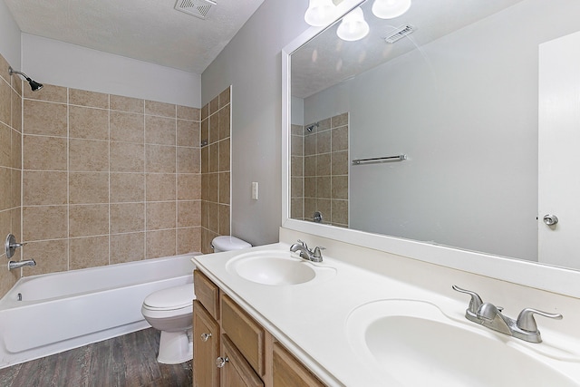 6626 Rusty Ridge Ln, Katy, TX 77449 - full bathroom featuring toilet, a sink, and visible vents