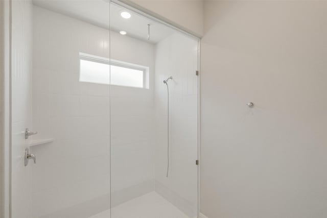full bathroom featuring a stall shower