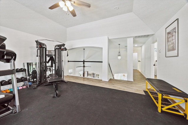 workout room featuring visible vents and ceiling fan
