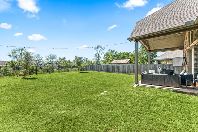 view of yard with a fenced backyard, outdoor lounge area, and a patio