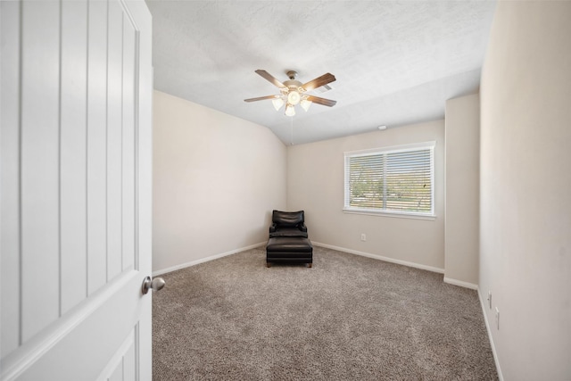 unfurnished room with carpet floors, baseboards, and ceiling fan