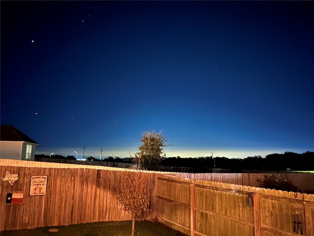 view of yard with fence