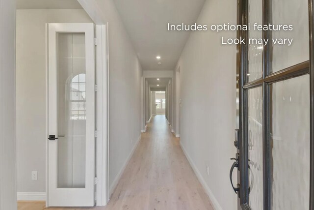 13136 Soaring Forest Dr, Conroe, TX 77302 - corridor with wood finished floors, baseboards, and recessed lighting