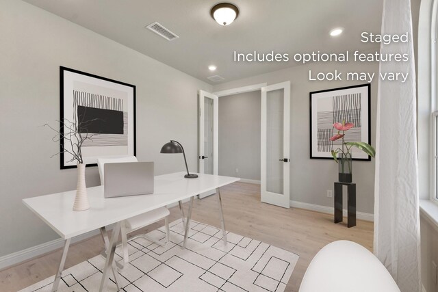 13136 Soaring Forest Dr, Conroe, TX 77302 - office area with light wood-style flooring, baseboards, and french doors