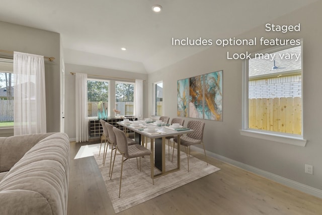 13136 Soaring Forest Dr, Conroe, TX 77302 - dining space featuring baseboards, wood finished floors, and recessed lighting