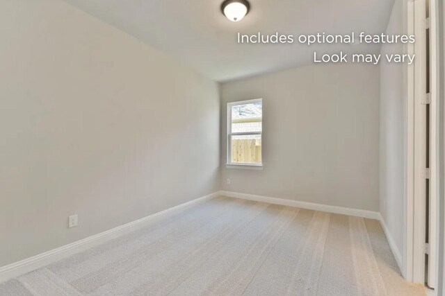 13136 Soaring Forest Dr, Conroe, TX 77302 - unfurnished room with light carpet and baseboards