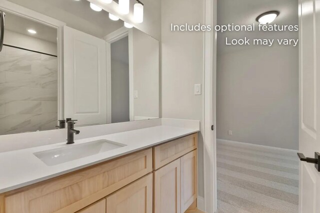13136 Soaring Forest Dr, Conroe, TX 77302 - full bathroom with vanity, baseboards, and recessed lighting