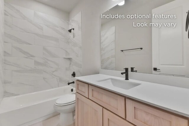 13136 Soaring Forest Dr, Conroe, TX 77302 - bathroom featuring vanity, toilet, and washtub / shower combination