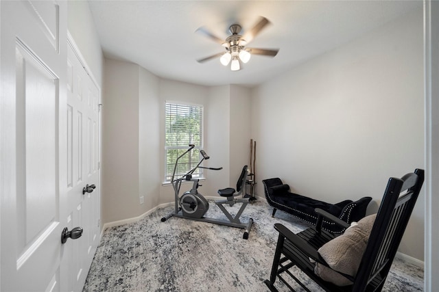 6607 Lake Woodlands Dr Unit 124, The Woodlands, TX 77382 - workout area featuring ceiling fan, baseboards, and carpet